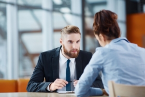 Recruiter asking questions during job interview